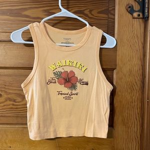 Graphic orange cropped top